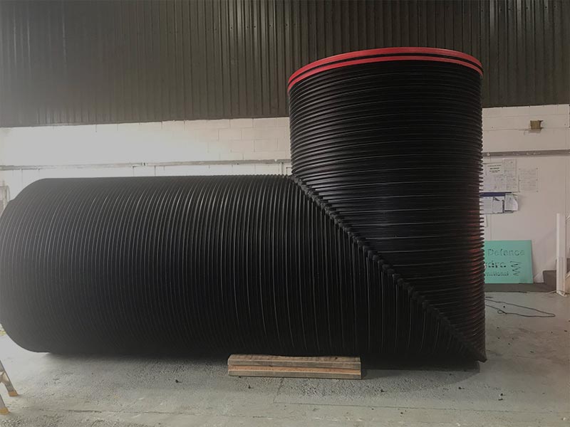 HFS Plastic work showcasing a HDPE length of pipe being made in the shape of an egg
