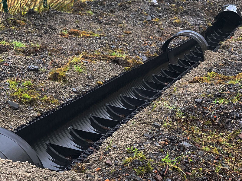 HFS Plastic work showcasing a HDPE length of pipe being made in the shape of an egg