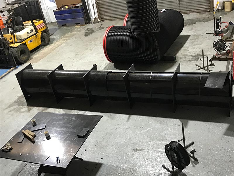 HFS Plastic work showcasing a HDPE length of pipe being made in the shape of an egg