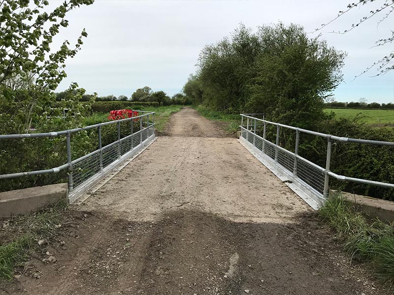 HFS carrying out a site service to repair a bridge by strengthening  and replacing railings