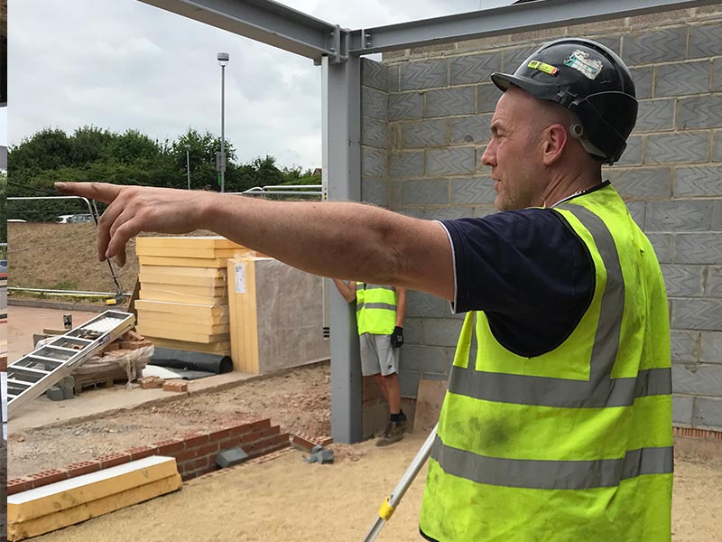 HFS members of staff carrying out an onsite installation which required structual steelwork to be erected for taunton dean services